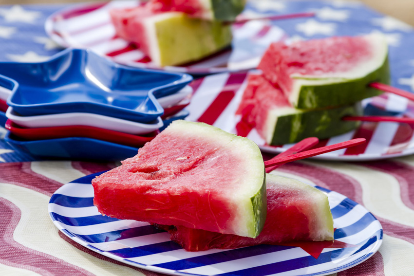 Watermelon slices on red white and blue plates
