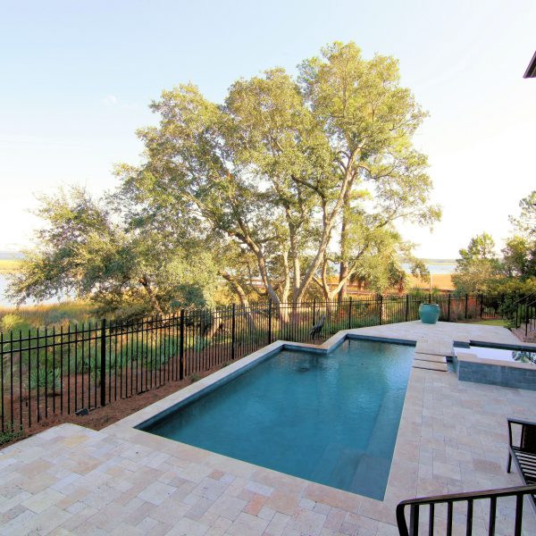 Geometric Pool overlooking a lake