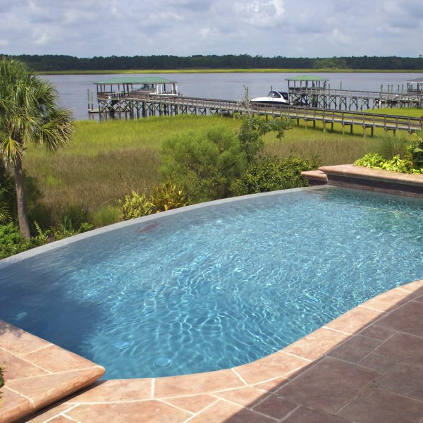 Custom Curved Infinity Pool with Tiled Surround