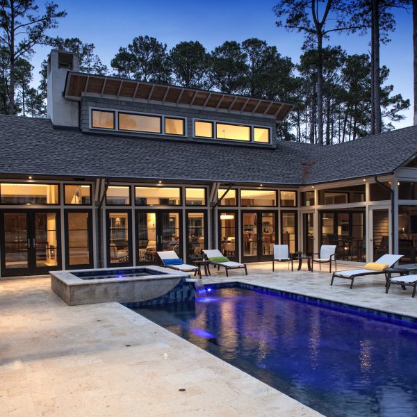 Custom Geometric Pool with Blue Lighting and Spa