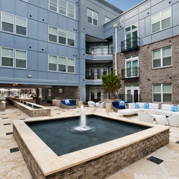 Outdoor fountain water feature in Elan Midtown apartments