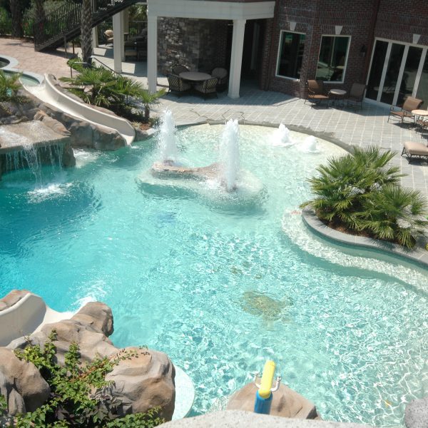 Outdoor pool with water fountain