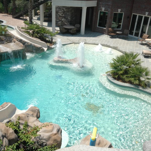 Outdoor pool with water fountain