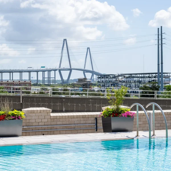 Rooftop pool with scenic view of Charleston’s Ravenel Bridge